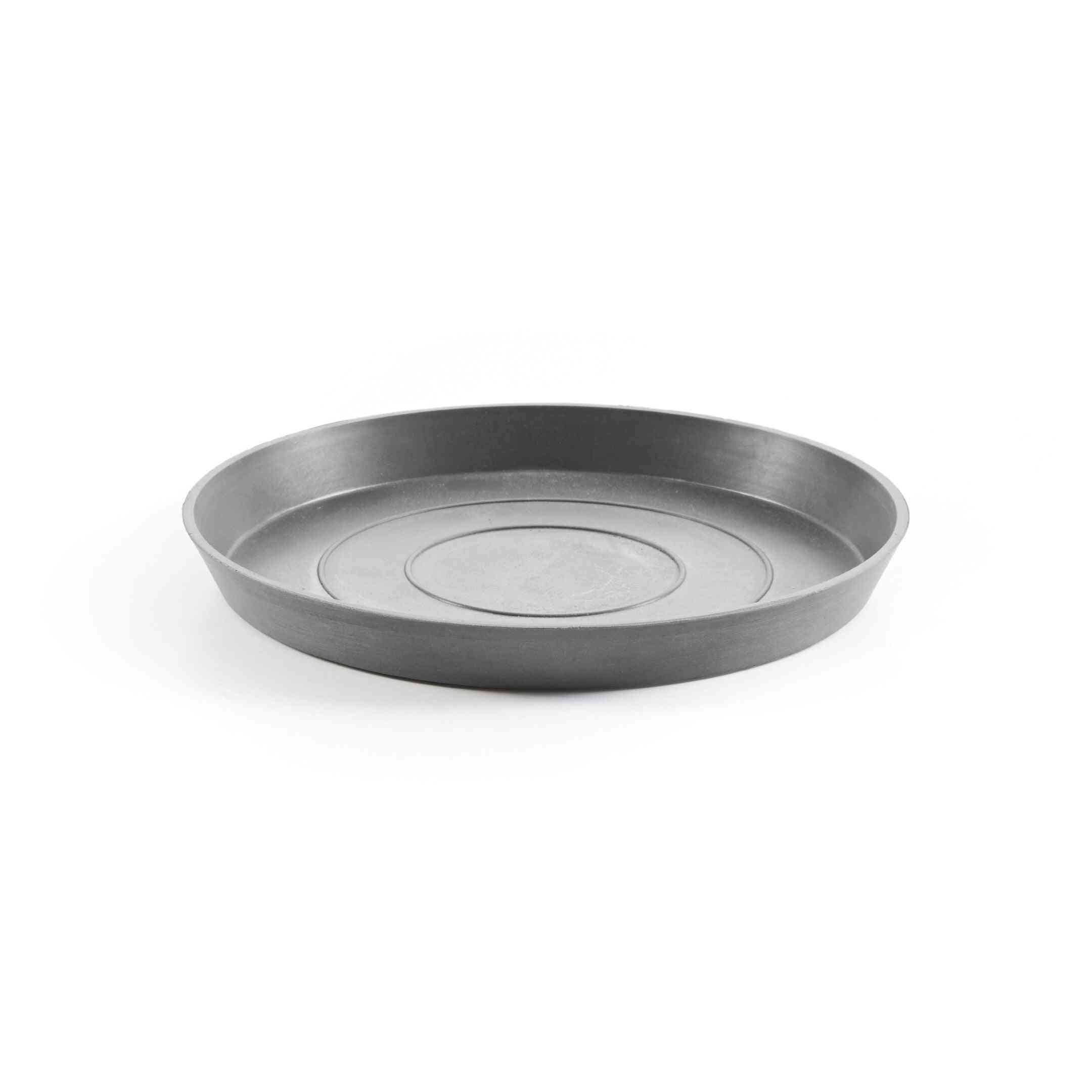 Чинийка за саксия – Ecopots saucer round 25 Grey в сив цвят, подходяща за стайни растения и кашпи Ecopots. Идеална за събиране на излишна вода.