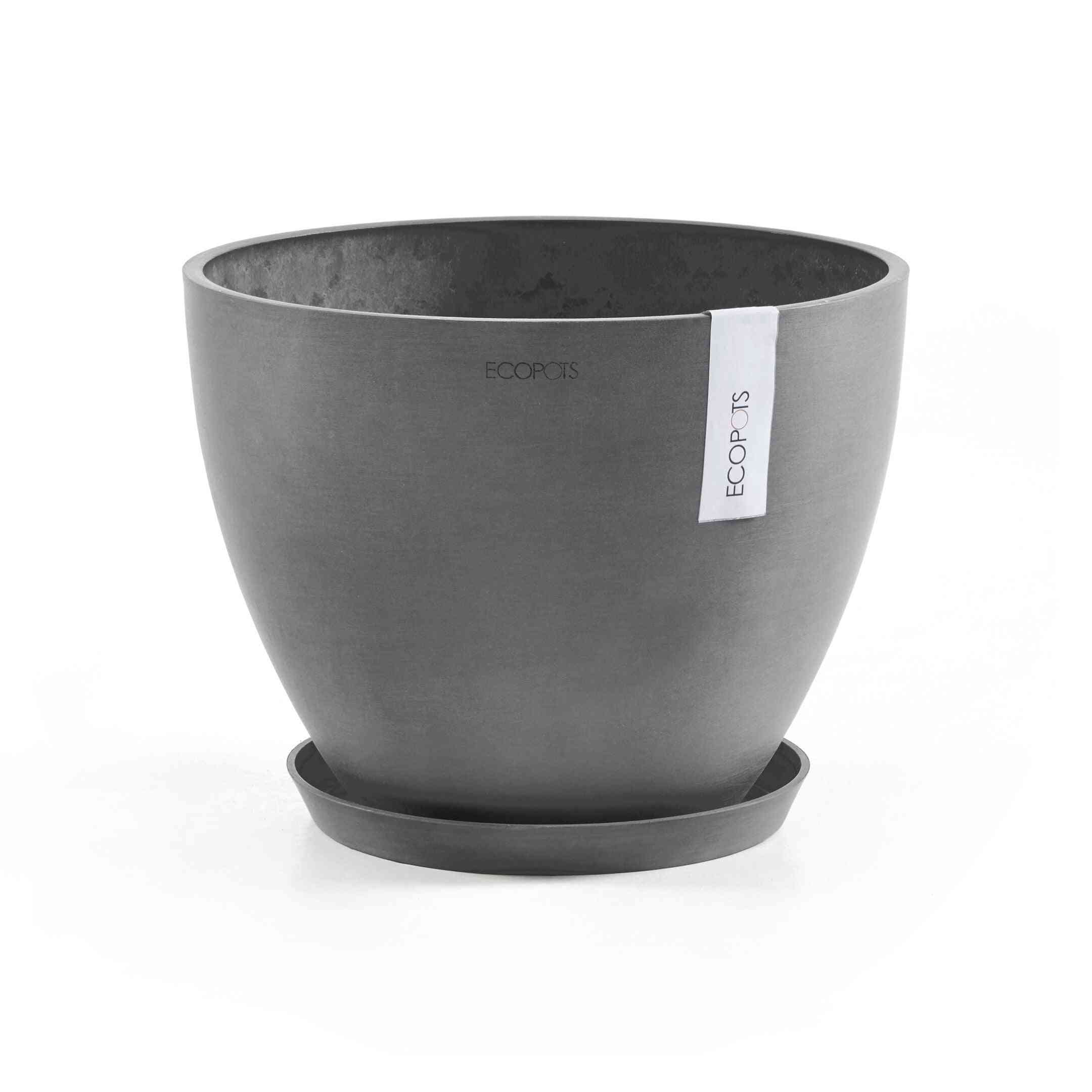 Саксия Ecopots със сива чинийка saucer round 25 Grey, подходяща за стайни растения. Част от устойчиви аксесоари за градинарство и декорация.