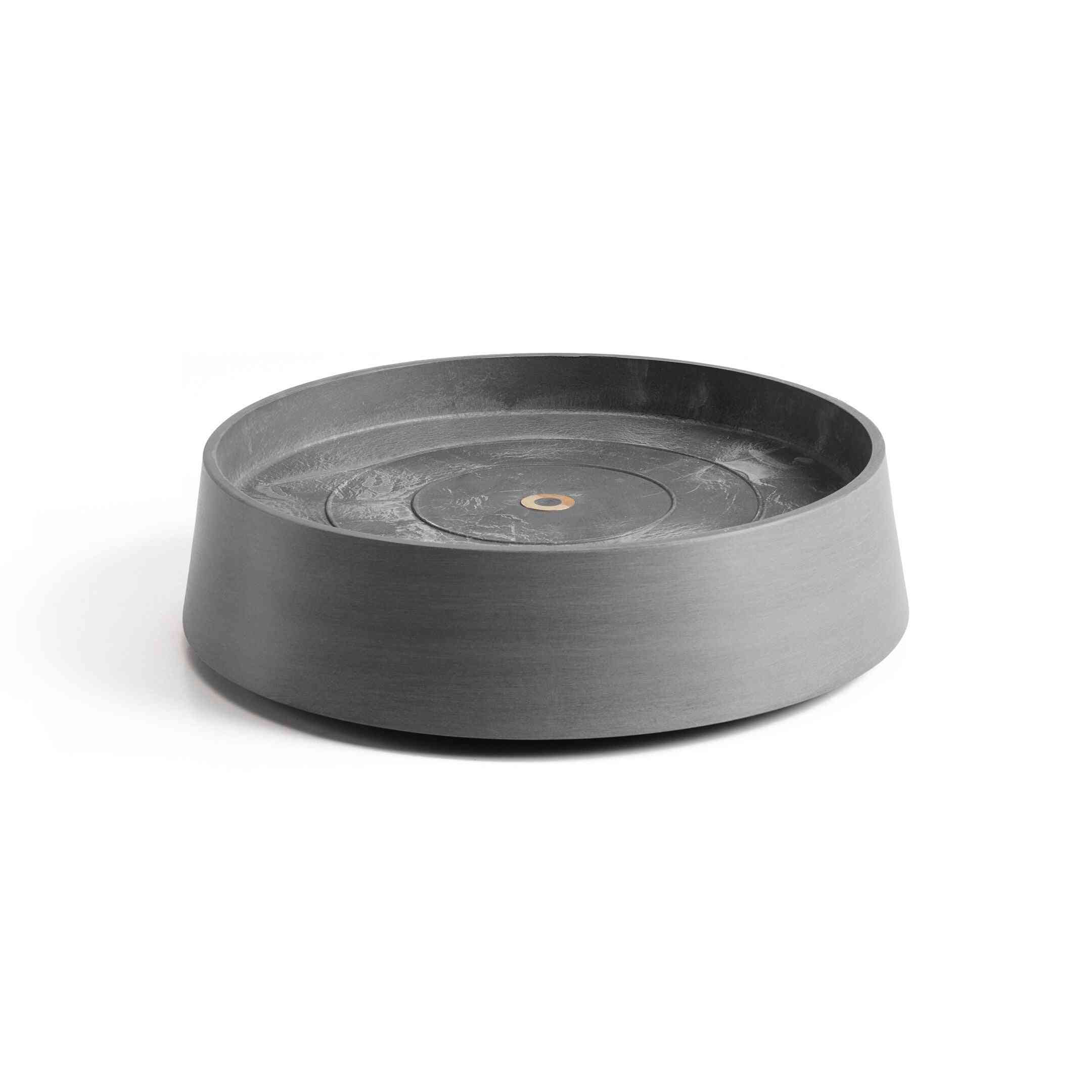 Чинийка на колелца - Saucer Wheels Oslo 35 Grey в сив цвят, подходяща за кашпи Ecopots и стайни растения. Идеална за лесно преместване на саксии.
