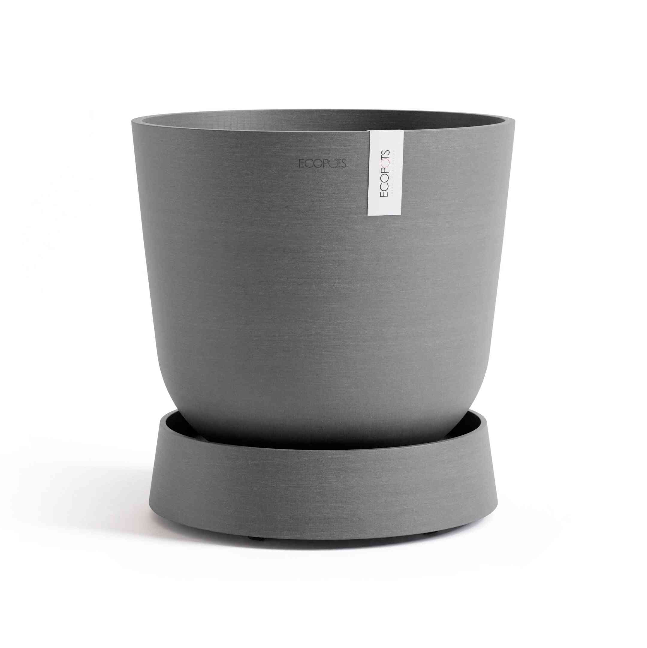 Кашпа Ecopots, поставена върху чинийка на колелца - Saucer Wheels Oslo 35 Grey, създаваща стабилна и мобилна основа за стайни растения.
